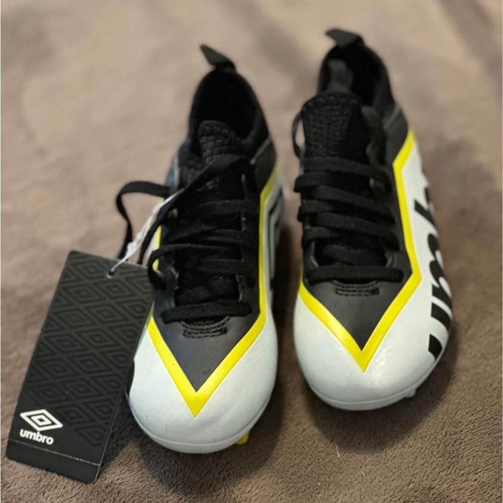 Umbro Black, Yellow, and White Soccer Cleats